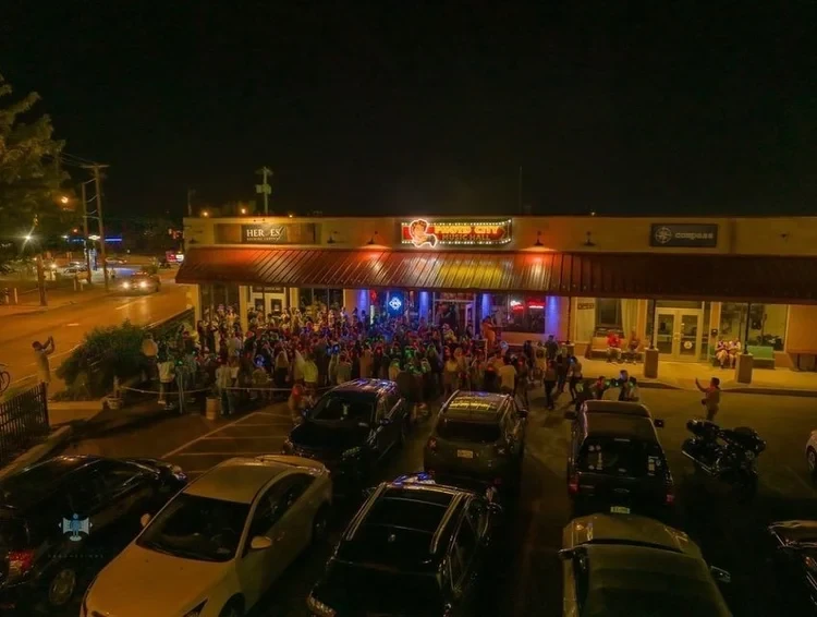 Crowd outside Photo City Music Hall at night